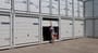 Container ad uso magazzino con portone sezionale a saracinesca