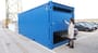 Storage container with sectional door